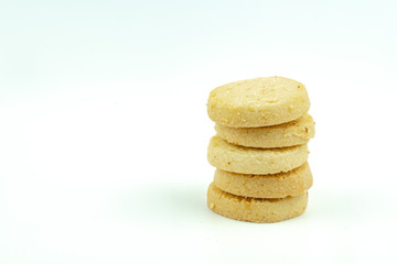Premium butter cookies isolated on white background with copy space. Shallow depth of field.