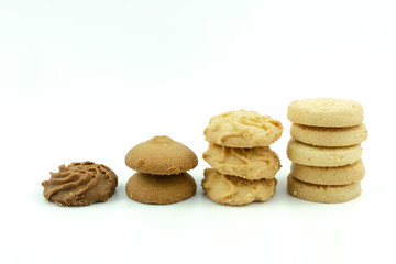 Premium butter cookies isolated on white background with copy space. Shallow depth of field.
