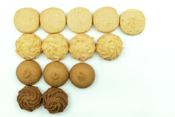 Premium butter cookies isolated on white background with copy space. Shallow depth of field.