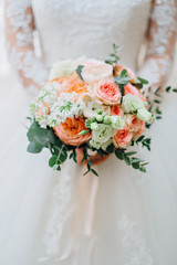wedding rings on a bouquet