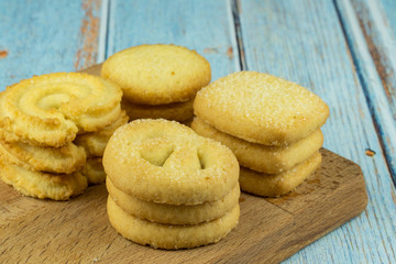 Premium butter cookies isolated on white background with copy space. Shallow depth of field.