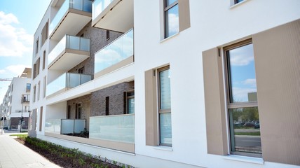 Modern apartment building on a sunny day with a blue sky. Facade of a modern apartment.