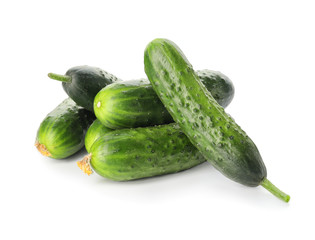 Green cucumbers on white background