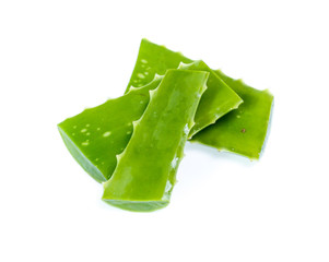 Fresh aloe vera leaves with water drops isolated on white