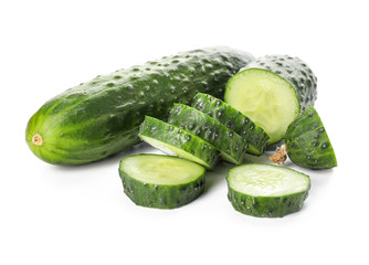 Green cucumbers on white background