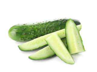 Green cucumbers on white background