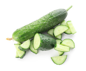Green cucumbers on white background