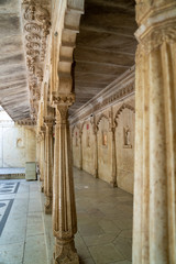 Udaipur, Rajasthan India - Stone marble columns of the City Palace in Udaipur. Portrait view