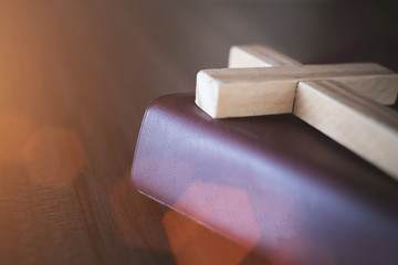 Bible and crucifix The symbol of blessing from God with the power and power of holiness which brings luck and shows forgiveness with the power of religion, faith, worship, Christian thought.