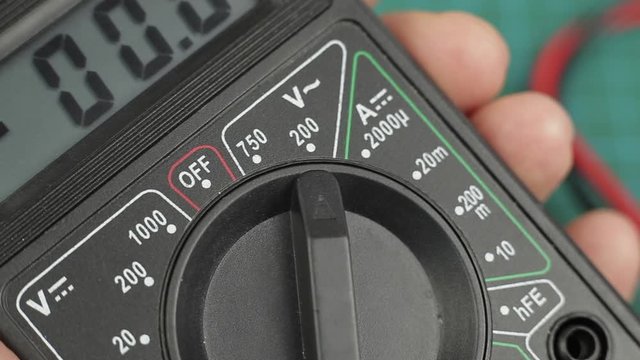 Electronic multimeter tool power on. Ready for voltage measuring. Close up