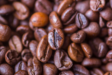 Texture of coffee beans close-up view from above