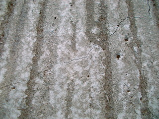 
The concrete wall of the building. Blurred defocused background for web design.