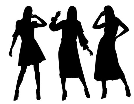 Set of black silhouettes of fashion model girls in mini different dresses standing and posing.
