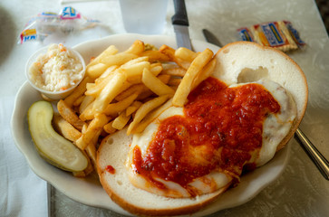plate of diner food with fries