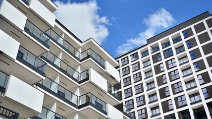 Fototapeta premium Facade of new residential building. Contemporary apartment building . Generic residential architecture.