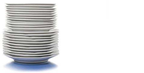Set of clean plates isolated in white. Stacked kitchen tableware. Element or component for design