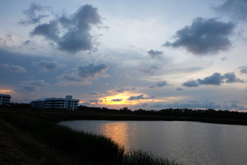 Obraz premium sunset over the river