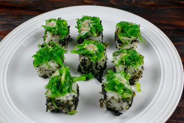 Japanese sushi rolls with seaweed.
