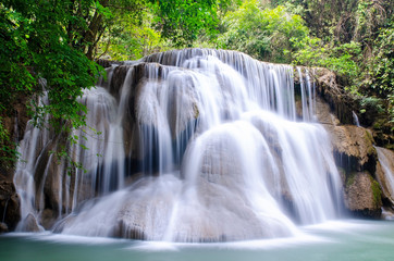 Exotic waterfall in green forest