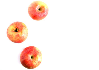Juicy red apples on a white background.