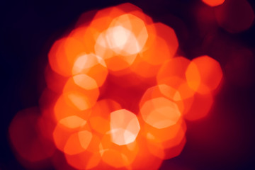Orange and red bright lights. Bokeh lights orange in circular form.