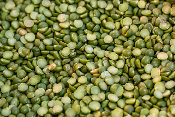 Background of dread green peas, closeup, food street , market