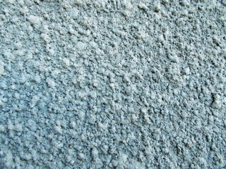 
The concrete wall of the building. Blurred defocused background for web design.
