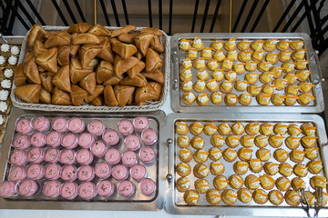 candy bar, buffet table, sets of cakes, sweets and snacks on the table