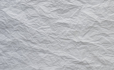 White and multicolored wrinkled paper surface, top view