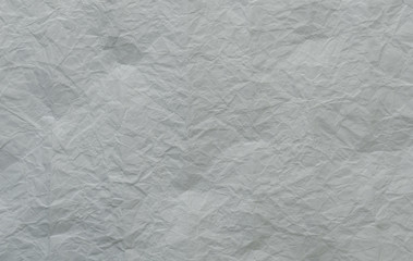 White and multicolored wrinkled paper surface, top view