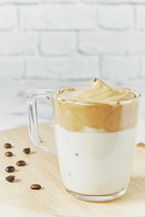 Iced Dalgona Coffee, fluffy creamy whipped coffee. South korean coffee for Covid-19