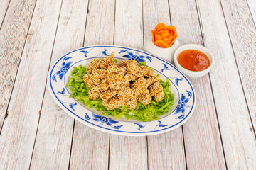 chicken dish with sesame and sauces