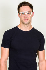 Obraz premium Portrait of young handsome man with eyeglasses