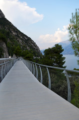 Obraz premium Terraced bike path over Lake Garda. Ciclopista del Garda. Limone sul Garda, Italy