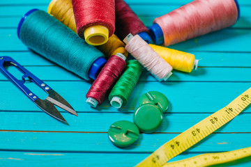 Set of tailoring tools and accessories on table