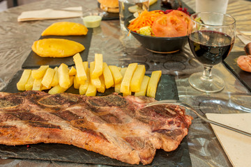 grilled meat with potato garnish