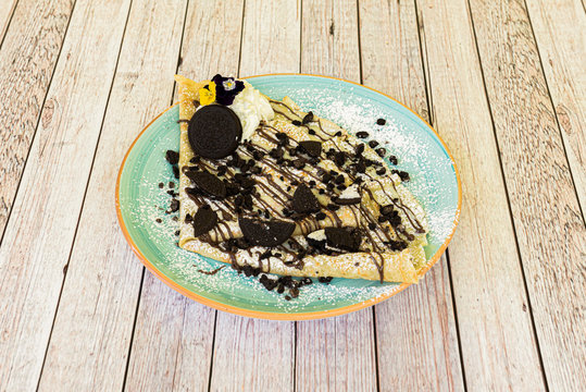 sweet crepe with chocolate and oreo cookies