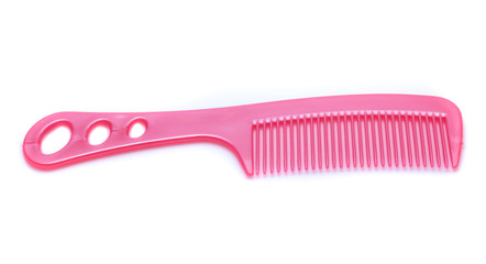 Pink comb isolated on white background