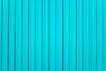 Turquoise background. Blue abstract corrugated metal wall