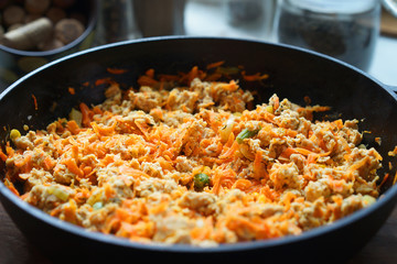 Cooking at home kitchen chicken meat side dish. Cook fry minced meat with vegetables.