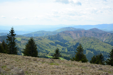 Fototapeta na wymiar Donovaly, Slovakia - May 10, 2019: Beautiful view from the top of the mountains in the late spring