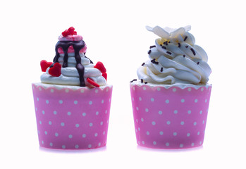 colorful cupcakes isolated on a white background