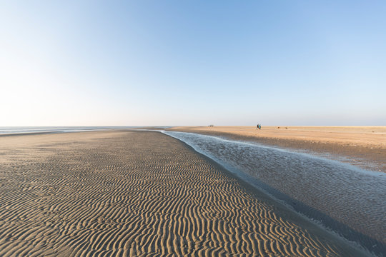 Denmark, Romo, Clear sky over rippled beach