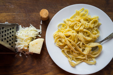 cooking pasta with cheese at home cooking.