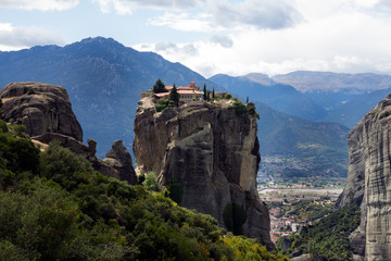 Fototapeta na wymiar Meteora, Greece, Holy Trinity monastery and Kalambaka city in background