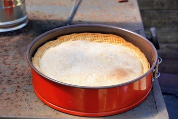 Vegetable pie in red baking dish