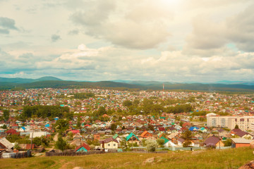 Obraz premium View of the old part of the city of Miassa. It is located in the southern part of the city. In the background you can see the mountain ranges of the southern Urals