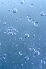 Colored air bubbles in water