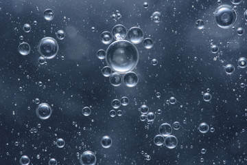 Colored air bubbles in water