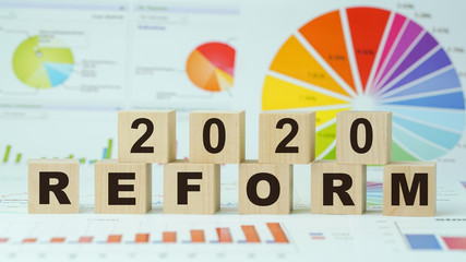 reform 2020 text on wooden blocks diagram background